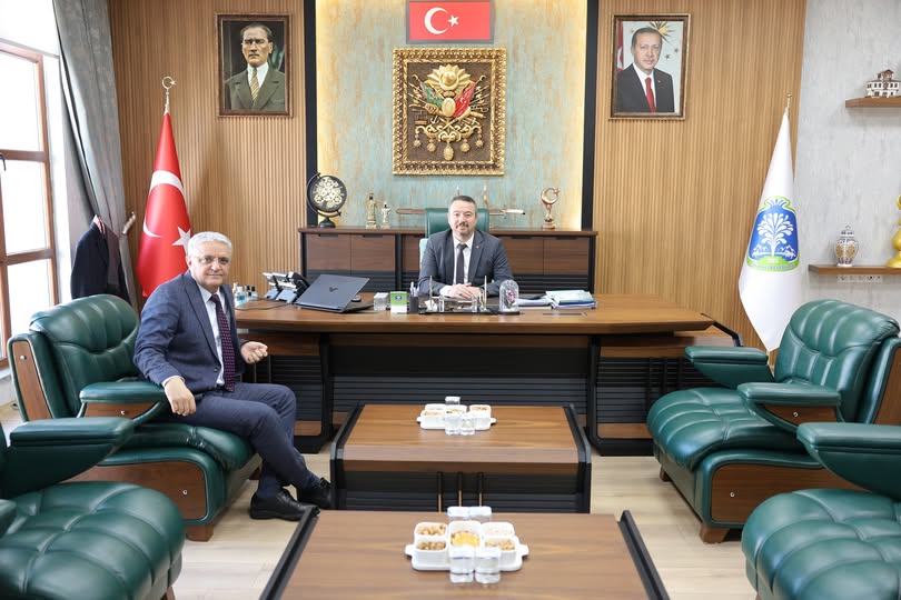 Sandıklı'da Nüfus Müdürü'nden Belediye Başkanı'na Nezaket Ziyareti