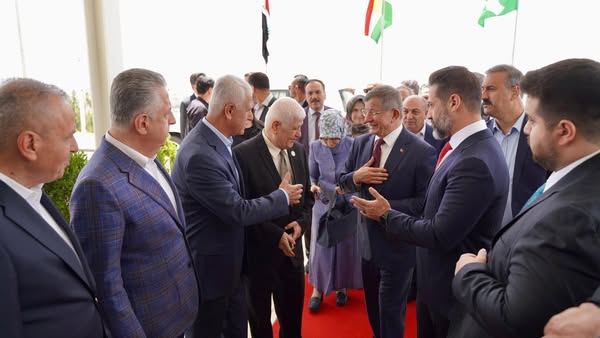 Davutoğlu ve Heyeti, Irak'ta Talabani'nin Kabrini Ziyaret Etti, Delfi Forumu'na Katıldı