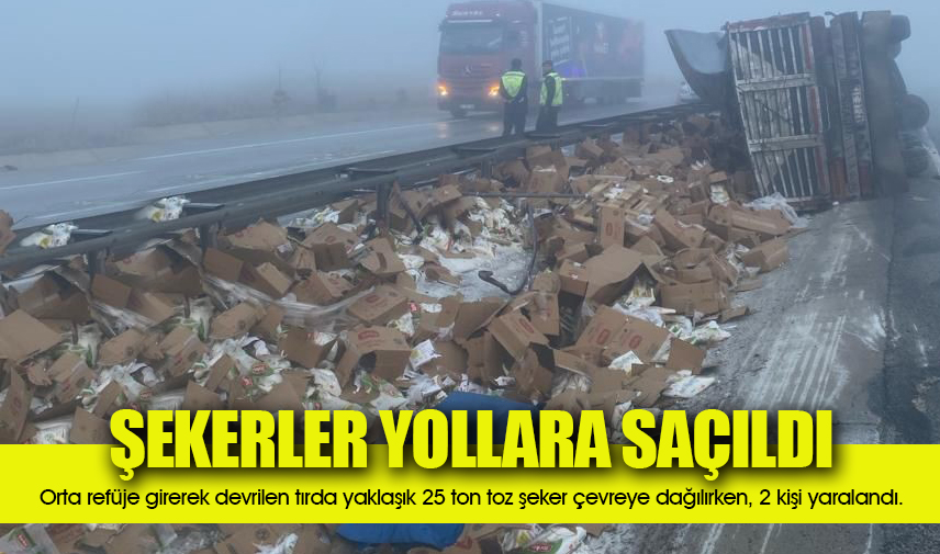 Toz şeker yüklü tır refüje girerek devrildi, 2 kişi yaralandı