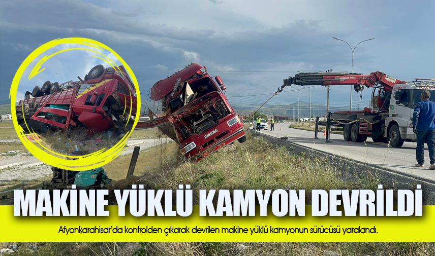 Makine yüklü kamyon devrildi, sürücüsü yaralandı